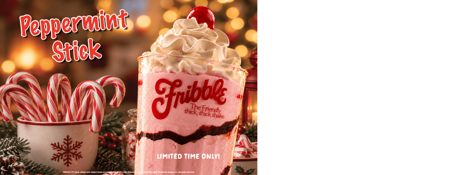 A pink peppermint shake topped with whipped cream and a cherry, beside a mug of candy canes. Limited time only.